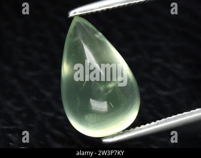 natural green prehnite gem on background Stock Photo