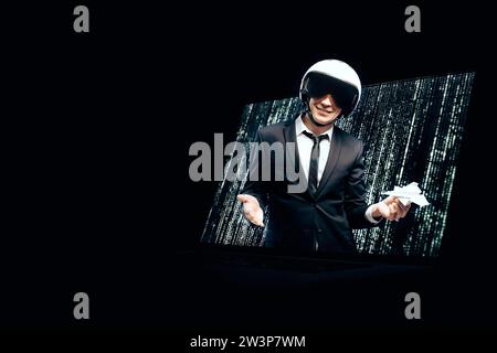 Portrait of a man in a suit and helmet. He launches a paper airplane from a laptop screen. Web Design Concept. Mixed media Stock Photo