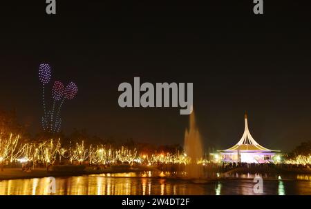 performance of light drone flying on sky at Suan Luang Rama 9 public park in Thailand Stock Photo