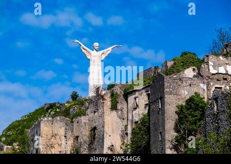 The Statue of Christ the Redeemer of Maratea, Cristo Redentore di Maratea on the summit of the mountain Monte San Biagio. Stock Photo