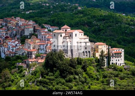The small town of Rivello with the church of Santa Maria del Poggio is picturesquely situated on the crest of a wooded range of hills. Stock Photo