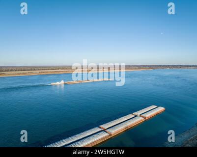towboat and barges on the Ohio River at confluence with the Mississippi below Cairo, IL, November aerial view Stock Photo
