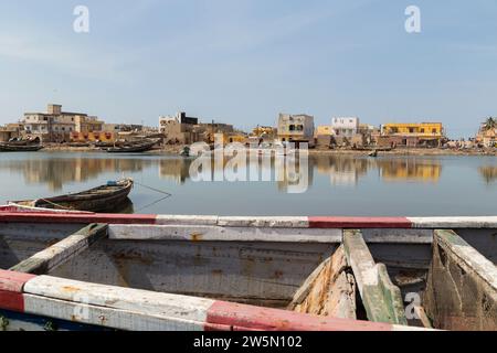 Saint Louis, Senegal: 28 January 2019 - Fishing boats resting on the riverbank of the river Senegal Stock Photo