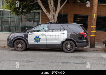 San Francisco Police Vehicle SFPD Parked On The Street, San Francisco, June 24, 2023 Police Cruiser Ford Police Vehicle Stock Photo