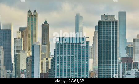 Foggy downtown skyscraper buildings in Chicago aerial, gloomy big city, daytime Stock Photo