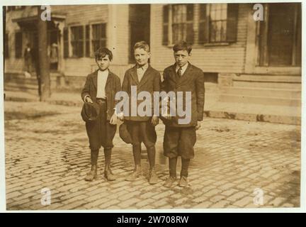 Willie Payton, (boy in middle), 196 Fayette St., Said 11 years old, made over $2 last week as pin boy in Les Miserables Alley, works there every night until about midnight. Joseph Philip Stock Photo