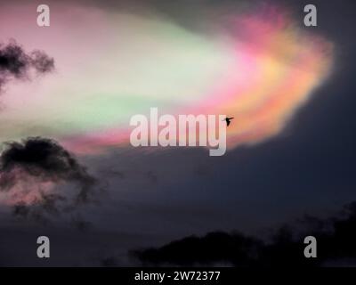 Aylesford, Kent, UK. 21st Dec, 2023. UK Weather: stunning Nacreous clouds seeen above Aylesford nr Maidstone in Kent this evening. Credit: James Bell/Alamy Live News Stock Photo