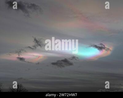 Aylesford, Kent, UK. 21st Dec, 2023. UK Weather: stunning Nacreous clouds seeen above Aylesford nr Maidstone in Kent this evening. Credit: James Bell/Alamy Live News Stock Photo