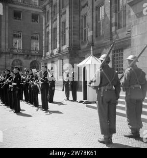 Military band and guard in front of the Royal Palace ca. May 1945 Stock Photo