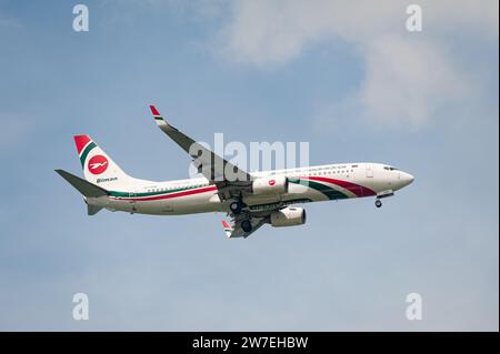 15.07.2023, Singapore, Singapur,  - A Biman Bangladesh Airlines Boeing 737-800 passenger aircraft, registration S2-AEW, approaching Changi Internation Stock Photo