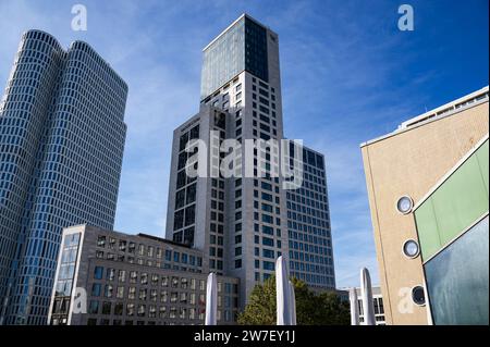 18.10.2023, Germany, Berlin,  - View of the Zoofenster skyscrapers with the Waldorf Astoria Hotel (right) and the Berlin-Upper West building complex ( Stock Photo