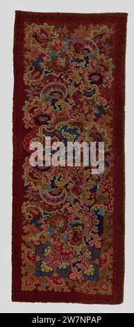 Carpet decorated with palmets and scallops ,, 1800 Carpet. On the dark red stock is placed in the middle, placed across, an omega-shaped palm with blue and green, with broken C-voluten contoured and flanked by whimsical serrated sculpts in dark blue, rose, orange, mustard yellow, red and violet; All sculptures are made up of concentric shapes in different nuances, and surrounded by black or white line. In two corners, a sloping red palmet, from which a branch originates with three blue palmets. The contours are also multi -colored and surrounded with whimsically. The edge shows panest spots in Stock Photo