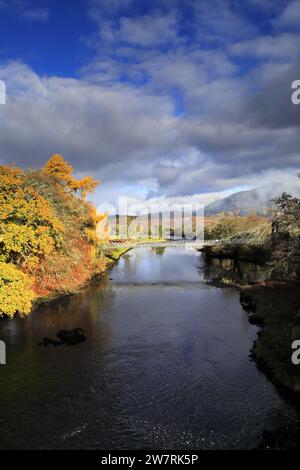 Autumn colours, the Bridge of Oich over the river Oich, Loch Oich, Highlands of Scotland, UK Stock Photo