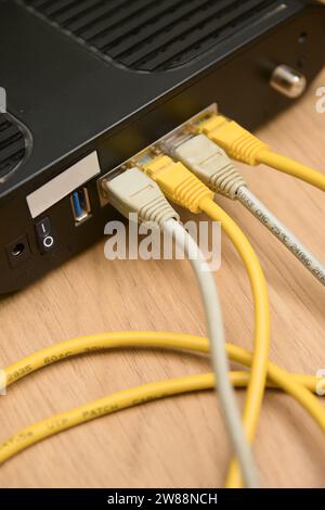 View of the RJ45 connections that a router has that are used to create local computer networks Stock Photo