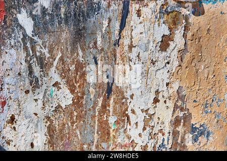 Multicolored Peeling Paint Texture on Metal Surface Close-Up Stock Photo
