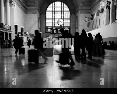 Commuters scramble to catch their train inside Union Station in Toronto, Ontario, Canada. Stock Photo