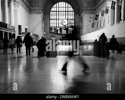 Commuters scramble to catch their train inside Union Station in Toronto, Ontario, Canada. Stock Photo