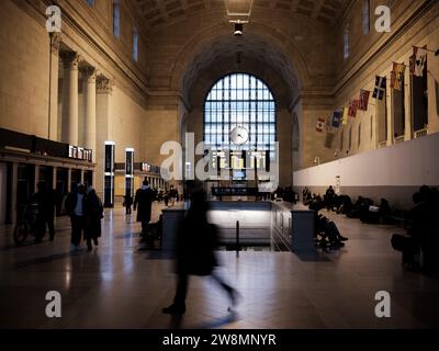 Commuters scramble to catch their train inside Union Station in Toronto, Ontario, Canada. Stock Photo