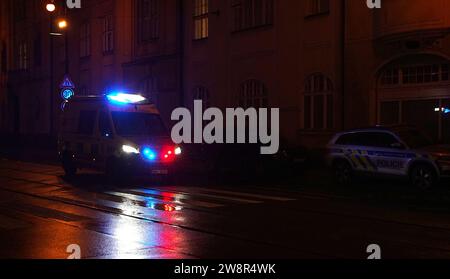 Prague, Czech Republic. 21st Dec, 2023. An ambulance is seen near the site of a shooting in Prague, the Czech Republic, on Dec. 21, 2023. At least 15 people were killed in a shooting at a school in the Czech capital Prague on Thursday, local police said. Credit: DanaKesnerova/Xinhua/Alamy Live News Stock Photo