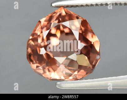 natural brown zircon gem on background Stock Photo