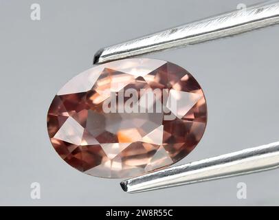 natural brown zircon gem on background Stock Photo