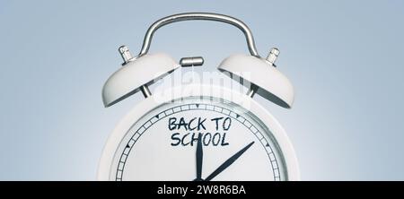 Vintage Alarm Clock Showing Back To School Arrows. Beginning Of The School Season. Education. Students Start. School And Clock, Concept Stock Photo