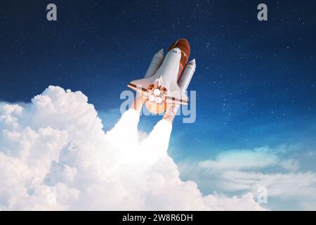New Rocket Flies To Another Planet. Spaceship Takes Off Into The Starry Sky. Rocket Starts Into Space. Concept. Spaceship Shuttle Lift Off Through The Stock Photo