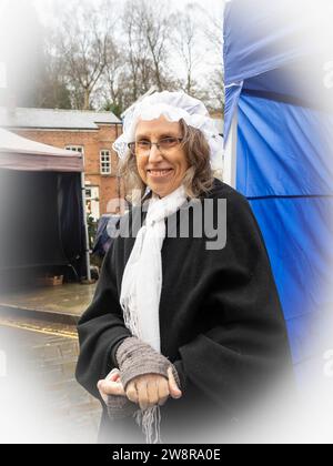 Lymm Dickensian Day 2023. People dressed in Dickensian costume; stalls in the streets; street entertainment; Grand Parade Stock Photo