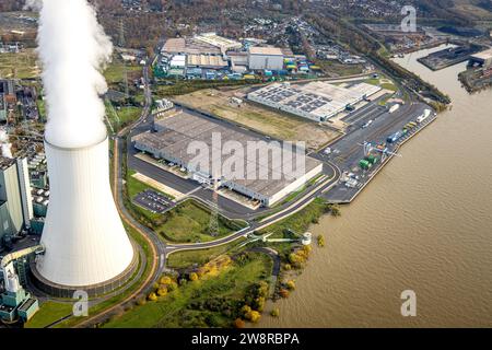 Aerial view, logport VI (Six) industrial area logistics services, STEAG power plant Walsum with smoking cooling tower on the river Rhine, surrounded b Stock Photo