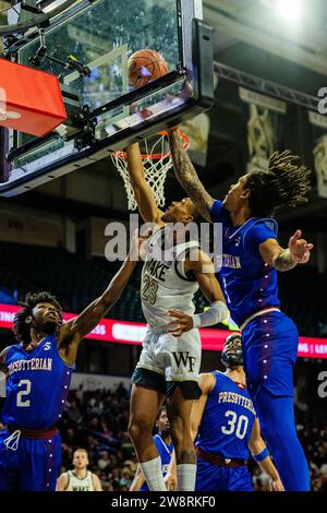 Winston-Salem, NC, USA. 21st Dec, 2023. Wake Forest Demon Deacons guard Hunter Sallis (23) shoots against the Presbyterian Blue Hose in the NCAA Basketball matchup at LJVM Coliseum in Winston-Salem, NC. (Scott Kinser/CSM). Credit: csm/Alamy Live News Stock Photo