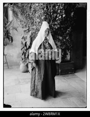 Woman wearing dowry necklace. Stock Photo