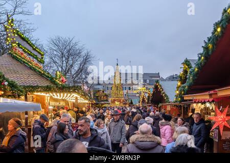 Bonn, Germany - December 16, 2023 : People walking around the traditional  and picturesque Christmas Market in Bonn Germany Stock Photo