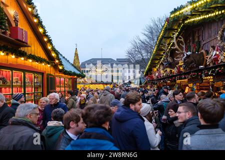 Bonn, Germany - December 16, 2023 : People walking around the traditional  and picturesque Christmas Market in Bonn Germany Stock Photo