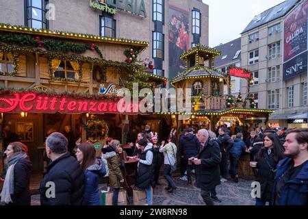 Bonn, Germany - December 16, 2023 : People walking around the traditional  and picturesque Christmas Market in Bonn Germany Stock Photo