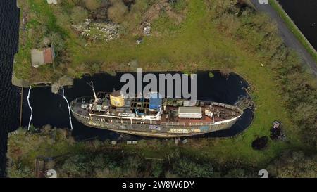 PA REVIEW OF THE YEAR 2023 File photo dated 25/01/23 - General views of the MV Naomh Eanna, an old ship that ferried people to and from the Aran Islands decades ago, which has capsized in the Grand Canal dock in Dublin. The MV Naomh Eanna was built in Dublin in the 1950s and was the main mode of transport connecting Co Galway to the Aran Islands from the 1960s until the 1980s. Despite plans to salvage the ship being mooted over the years, including making it part of a Maritime Quarter in Dublin, it has been left to languish. Issue date: Friday December 22, 2023. Stock Photo