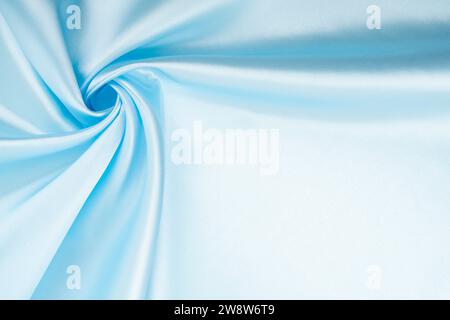 Texture of the satin fabric of blue color for the background Stock Photo