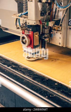 Industrial laser cutter. Laser cutting process of wood Stock Photo