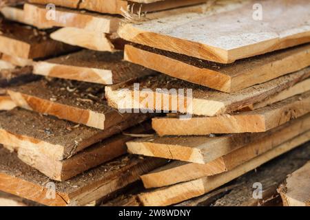 Large stack of wood planks, teak wood Stock Photo