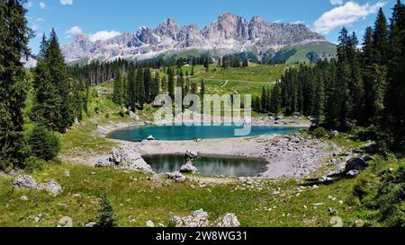 drone photo carezza lake, lago di carezza, Karersee dolomites italy europe Stock Photo