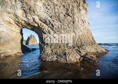 View of sea stack through Hole-In-The-Wall, Olympic National Park Stock Photo