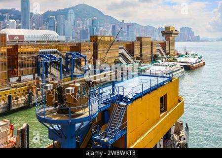 Hong Kong, China - July 23, 2009 : Ferry terminals at Victoria Harbour. Transport between Kowloon and Macau, China at the golden China Ferry Terminal. Stock Photo