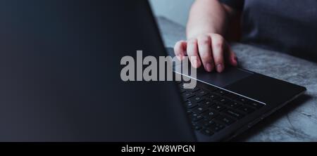 Business woman hands typing on laptop keyboard. Business technology concept with empty space for web banner. Woman worker and business concept. Stock Photo