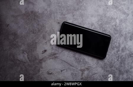 Top view photo of smartphone clean screen. Chroma key phone screen in horizontal position. Photo mockup with copy space. Internet of things. Stock Photo