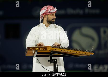 Arab musician plays qunan zither before the trophy presentation  of the Dubai Duty Free Tennis Championships,Dubai,United Arab Emirates. Stock Photo