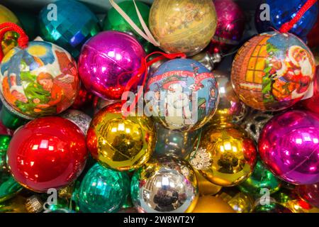 Closeup of colourful Christmas decorations and baubles in a box Stock Photo