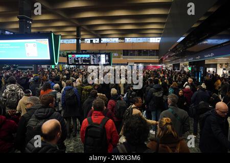 Passengers at Euston station, London, as Christmas getaway chaos is ...