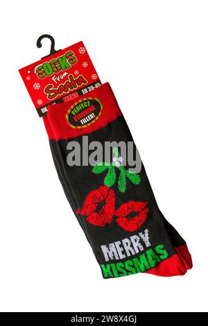 Mens Christmas novelty socks - pair of festive socks with Merry Kissmas Socks from Santa set on white background - novelty socks for Christmas present Stock Photo