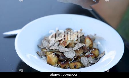 Black and White Truffles Recipe - White Truffle Recipe Served on a White Plate Stock Photo
