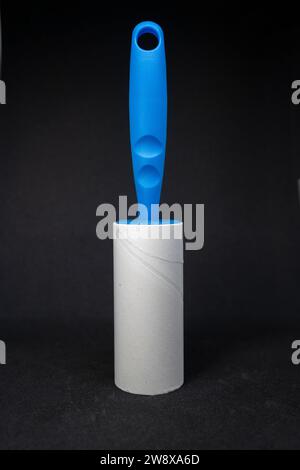 Sticky roller lint remover for clothes Stock Photo