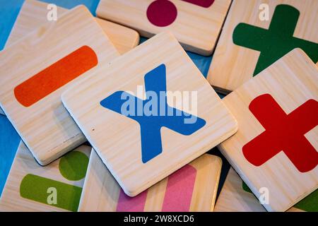 Colorfularithmatic symbols on wooden magnets Stock Photo